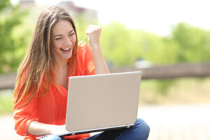 shutterstock 274684448 300x200 - Euphoric,Woman,Searching,Job,With,A,Laptop,In,An,Urban